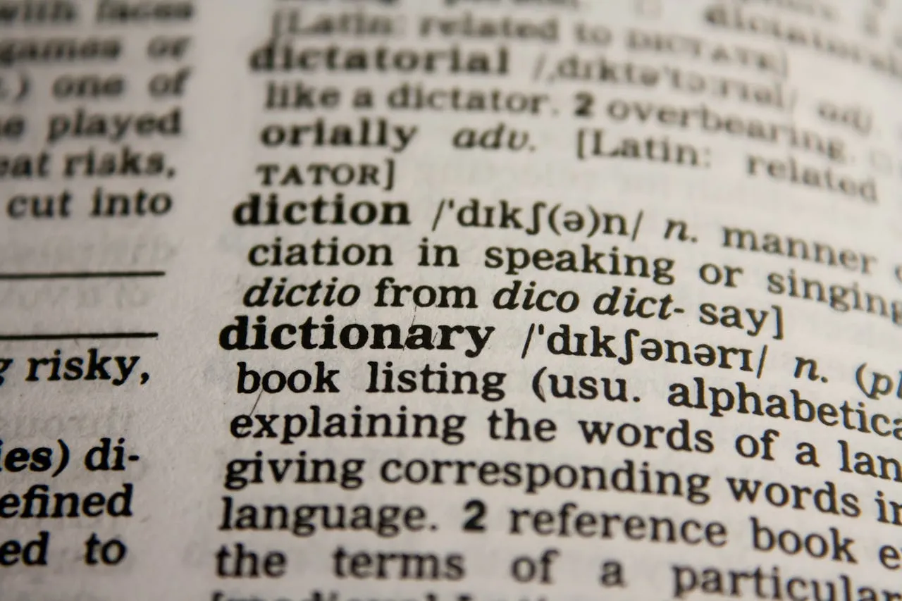 Dictionary page showing 'diction' definition, etymology, and Latin roots.