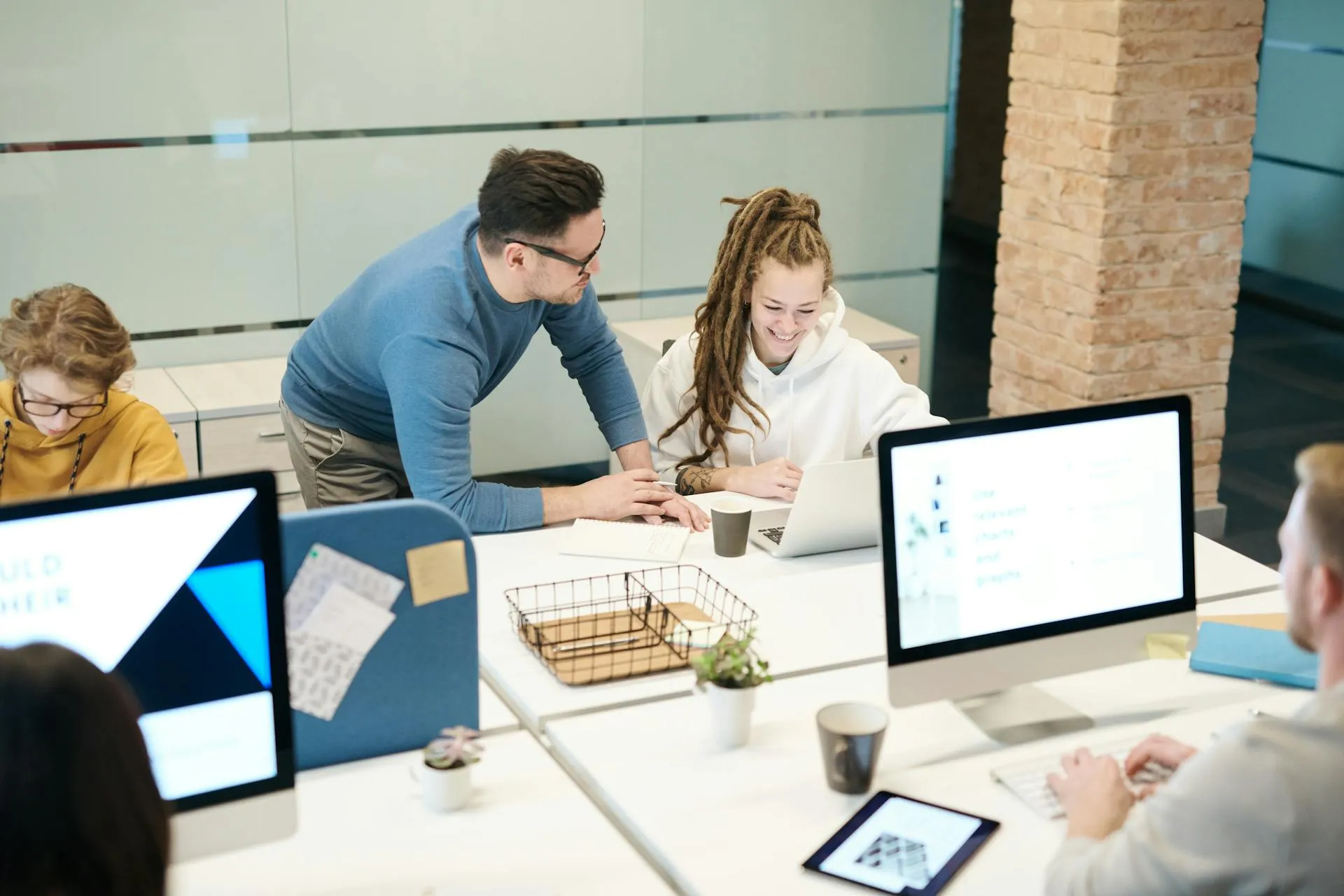 Team collaboration in modern office workspace