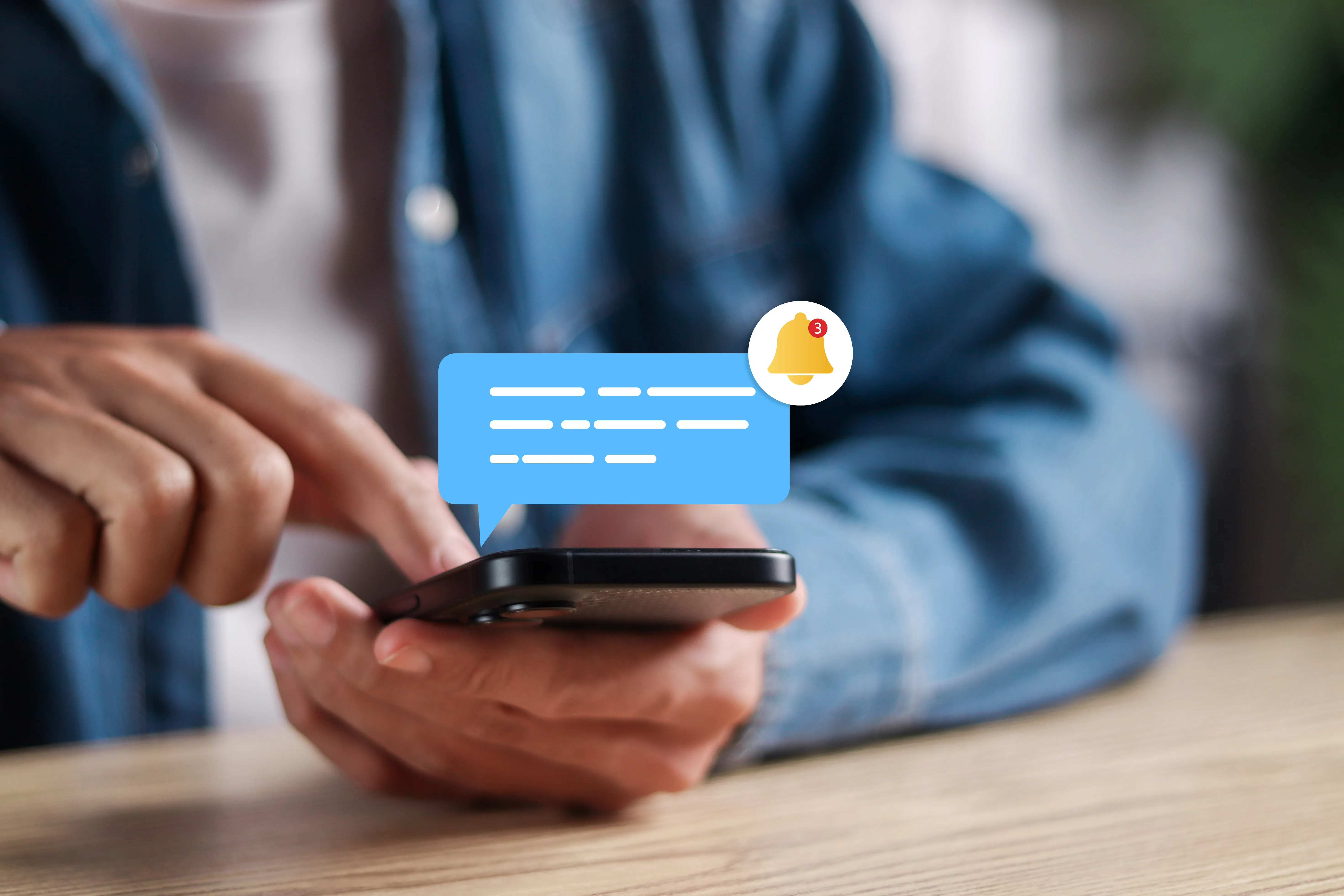 User receives chat and bell notifications on smartphone indoors.