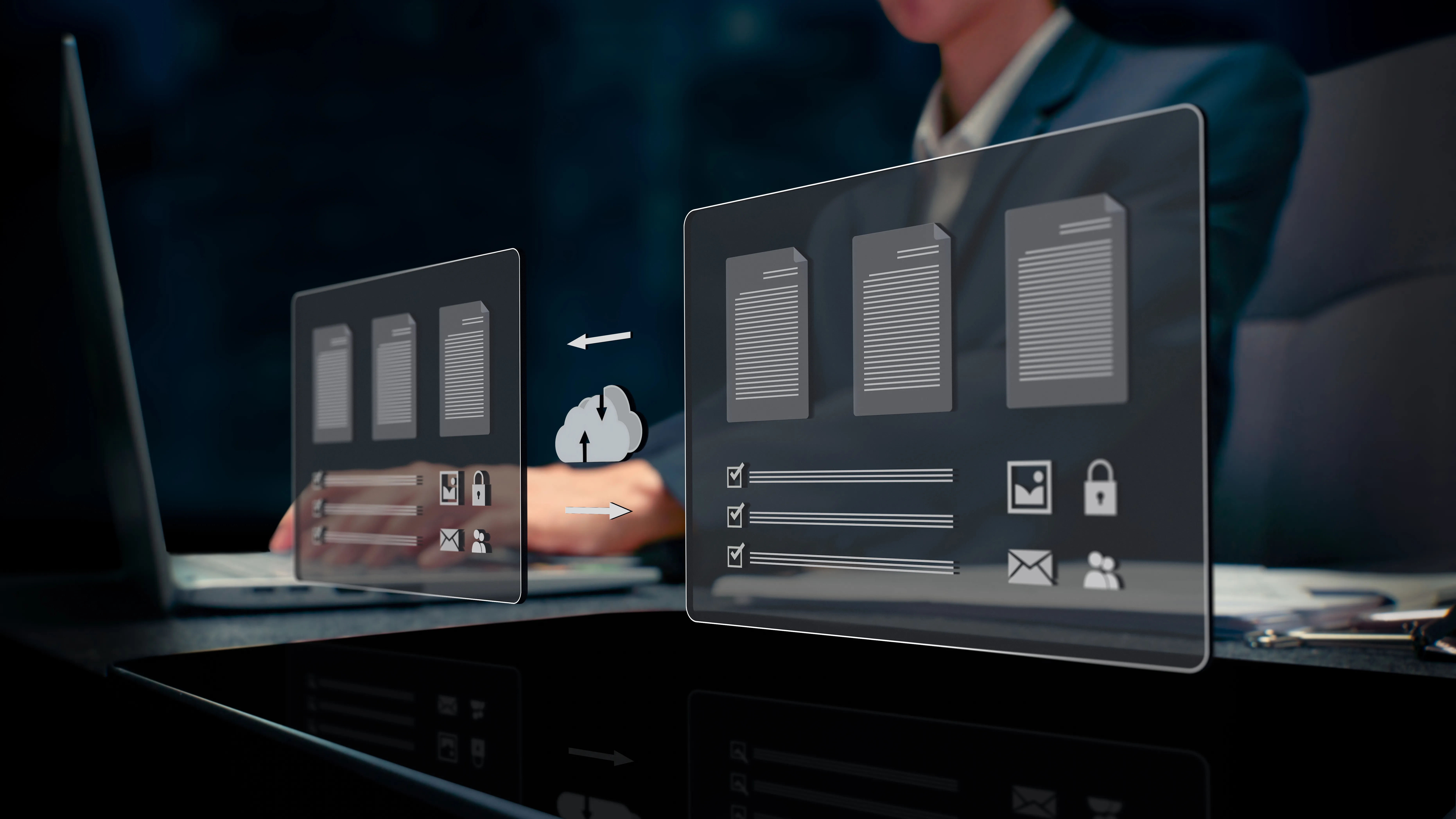 Person working on a laptop with holographic interface showing document management and cloud storage icons
